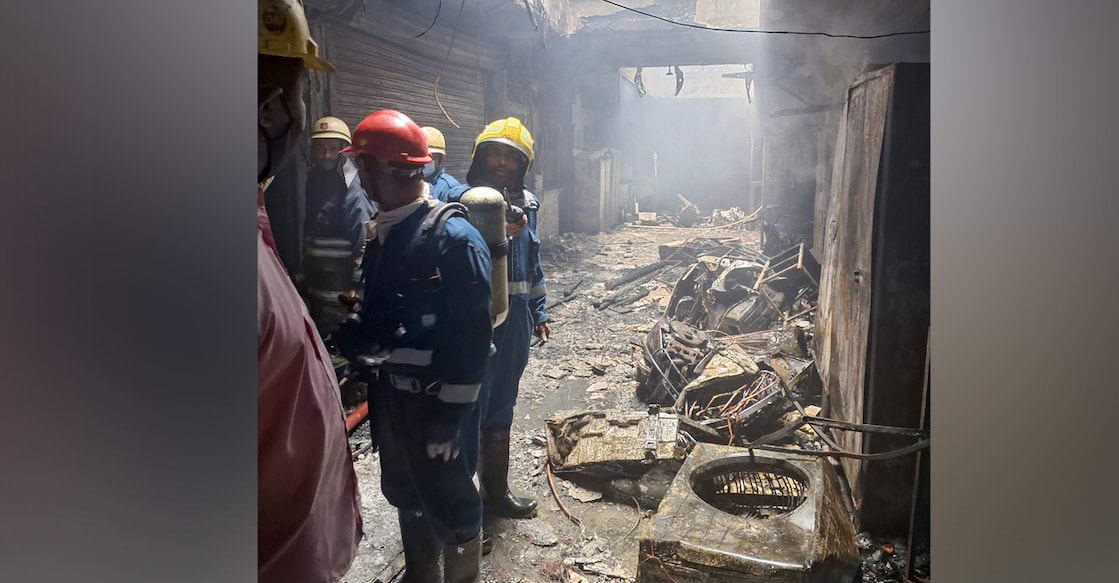 charminar fire Firefighters at the site after a fire broke out in a building near Gulzar House in the Old City area of Hyderabad.